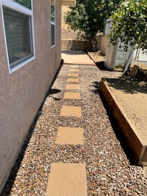 Desert stone pathway landscaping project in San Diego