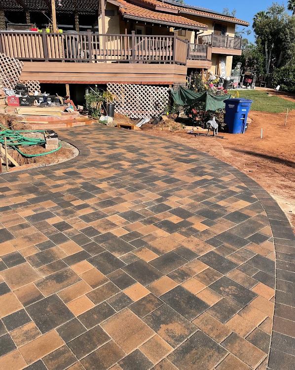 Paver patio installation beneath an existing deck in El Cajon